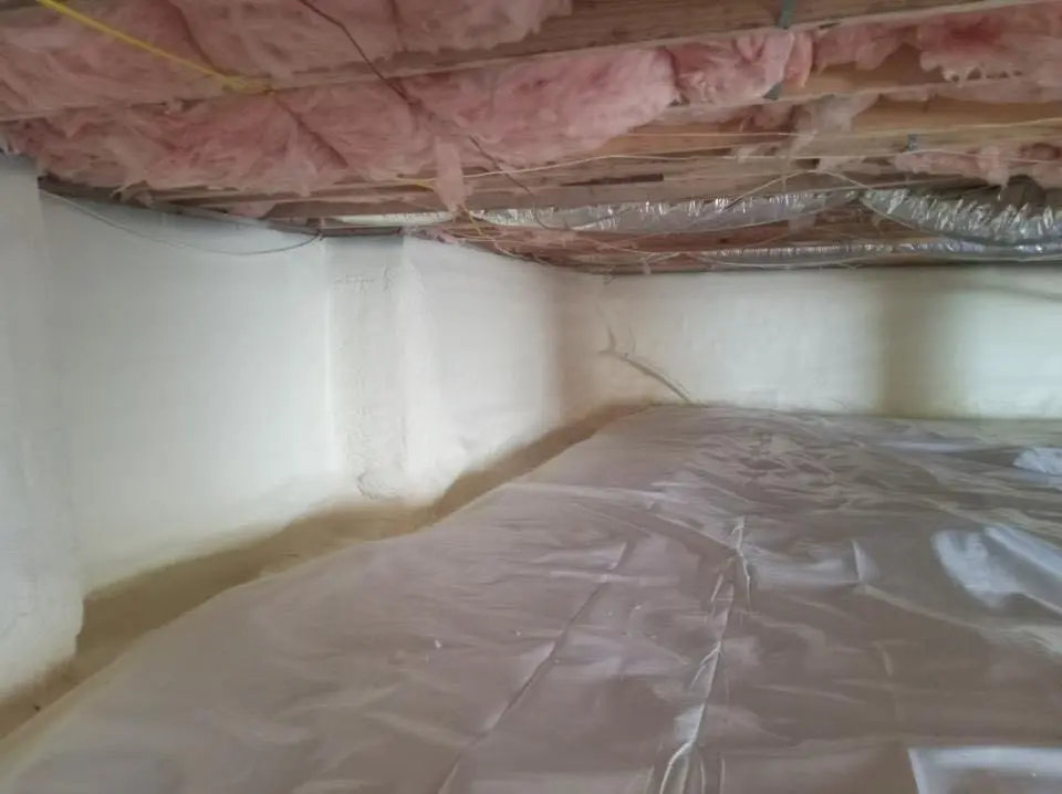 Crawl space encapsulation with closed-cell spray foam for Commercial Roof Restoration in Harvest